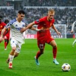 FC Copenhagen's Rodrigo Huescas and FC Nordsjaelland's Lucas Høgsberg tussle for possession