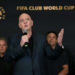 FIFA President Gianni Infantino speaks in front Roberto Baggio, Ronaldo, and Hristo Stoichkov during a press conference at the Trump Tower in New York