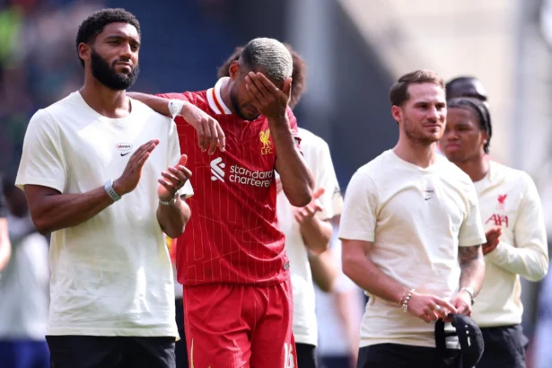 Cody Gakpo, standing alongside Joe Gomez, was moved to tears after the match