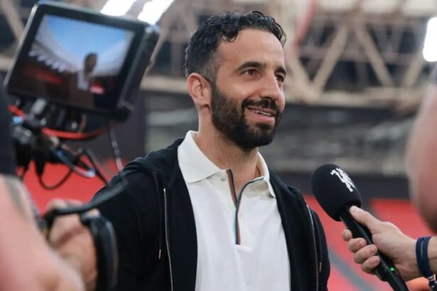 Man Utd head coach Ruben Amorim smiles during an interview