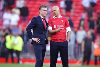 Arne Slot and Richard Hughes speak after winning the Premier League title.