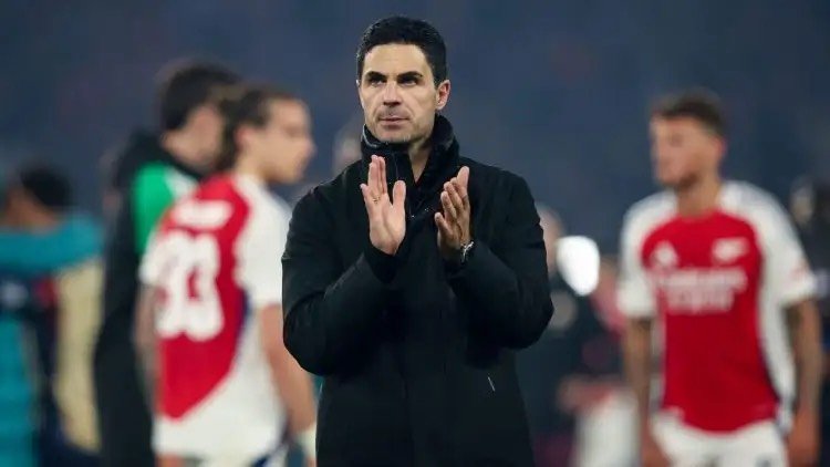Arsenal manager Mikel Arteta applauds the fans after losing to PSG