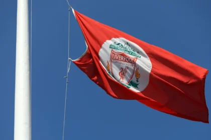 In a heartfelt pre-season friendly with Preston, Liverpool and their supporters paid tribute to Diogo Jota following his tragic passing. The club retired his No. 20 shirt, while fans and players honoured him with emotional ceremonies, including chants, a wreath-laying, and a goal celebration.
