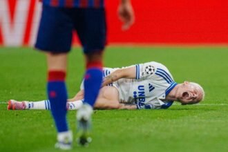 FCK's Magnus Mattsson gets injured during the Champions League qualifying match between FC Copenhagen and FC Basel