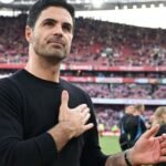 Arsenal manager Mikel Arteta applauds the supporters