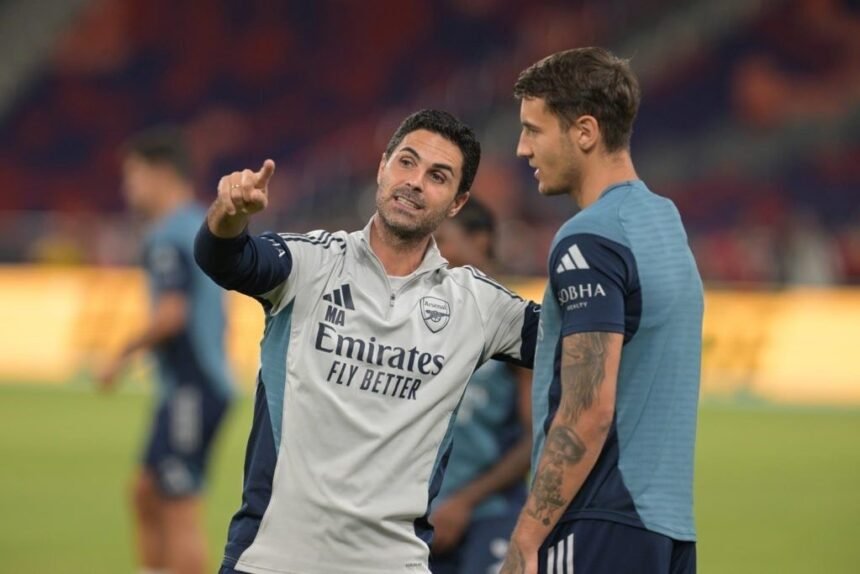 Arsenal manager Mikel Arteta and Jakub Kiwior