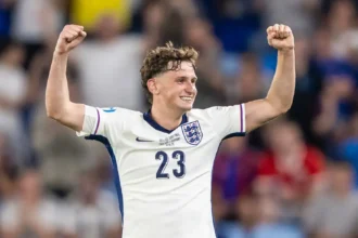 Liverpool have reached an agreement with French club Lyon for the transfer of young midfielder Tyler Morton, with the deal valued at £15 million. The 22-year-old England Under-21 star will be heading to Ligue 1 after making just 14 senior appearances for the Reds, as Jurgen Klopp looks to make space for further acquisitions. Morton’s move to Lyon is expected to be finalised soon, with negotiations reported to be at the "final stages" according to reliable sources like Fabrizio Romano. While Morton has shown promise, his lack of regular first-team action at Liverpool — making only five appearances last season — has led to a move away from Anfield. Despite his limited appearances, Morton played an instrumental role in England's Under-21 European Championship victory, assisting the winning goal in the final. The sale of Morton, an academy graduate, represents pure profit for Liverpool, adding to their funds as they continue to eye major signings this summer. The move could also serve as a precursor to Liverpool's ongoing efforts to sign a marquee player, with Alexander Isak still heavily linked to the club. Though their initial £120 million bid for the Newcastle striker was rejected, Liverpool remains in the market for a high-profile signing, and the Morton sale could pave the way for further business. For Morton, a move to Lyon presents an exciting opportunity for more regular first-team football at a prestigious European club, despite Lyon's current financial difficulties. The seven-time Ligue 1 champions are aiming to rebuild and return to their former glory, and Morton could play a key role in that vision. Meanwhile, Liverpool’s transfer strategy isn’t just about buying; it’s also about raising funds through sales, and Morton’s departure could signal more exits in the coming weeks. Players like Darwin Nunez and Harvey Elliott are also being linked with potential moves, as the Reds continue to reshape their squad. As for Isak, the saga is far from over, and Liverpool’s pursuit of the Swedish striker could continue into the final weeks of the transfer window.