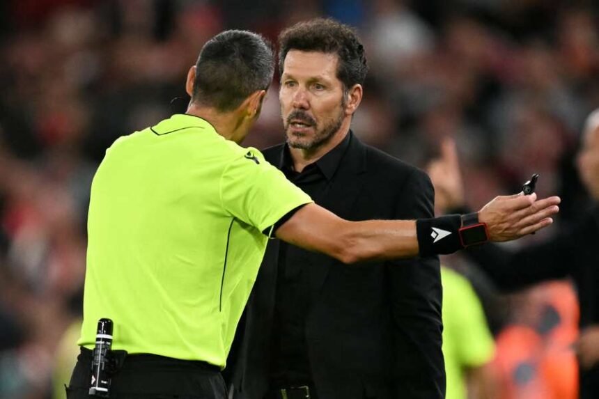 Diego Simeone is sent off by the referee during the UEFA Champions League first round football match between Liverpool and Atletico Madrid
