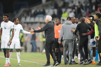 Hugo Broos slams ‘handball’ in Calvin Bassey’s equaliser as Bafana Bafana draw with Nigeria in World Cup qualifier