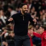 Ruben Amorim celebrates a goal during a match.