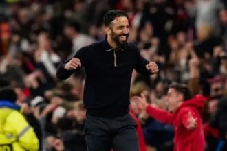 Ruben Amorim celebrates a goal during a match.