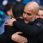 Pep Guardiola hugs Mikel Arteta ahead of a match.