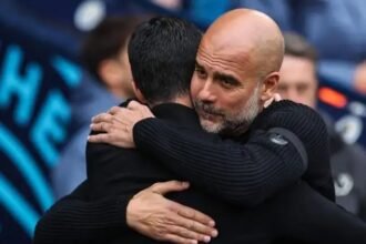 Pep Guardiola hugs Mikel Arteta ahead of a match.