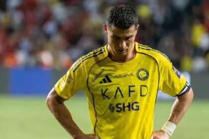 Cristiano Ronaldo puts his hands on his hips during a match.