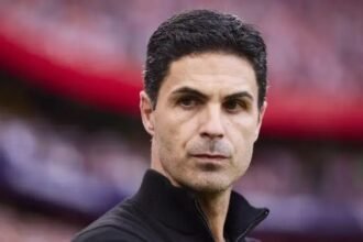 Mikel Arteta looks serious during a Premier League match.