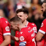 Wrexham Chief Bids Emotional Farewell to Club Hero Eoghan O'Connell After Departure