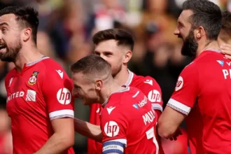 Wrexham Chief Bids Emotional Farewell to Club Hero Eoghan O'Connell After Departure