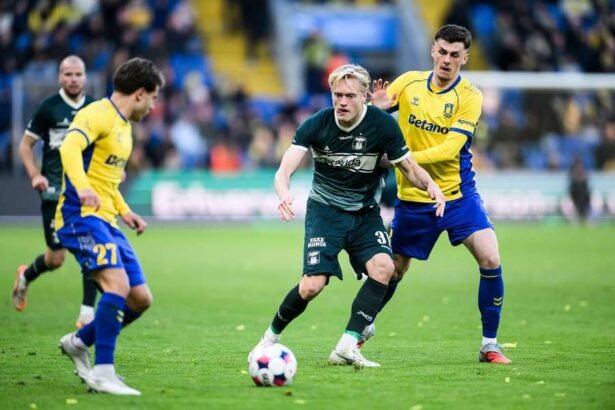 AGF's Tobias Bech fights for the ball with Brondby's Benjamin Tahirovic