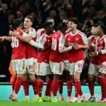Arsenal players celebrate win