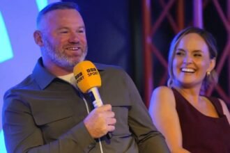 Wayne Rooney and Kelly Somers during a panel discussion