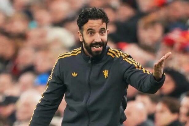 Ruben Amorim speaks to his players during a match.