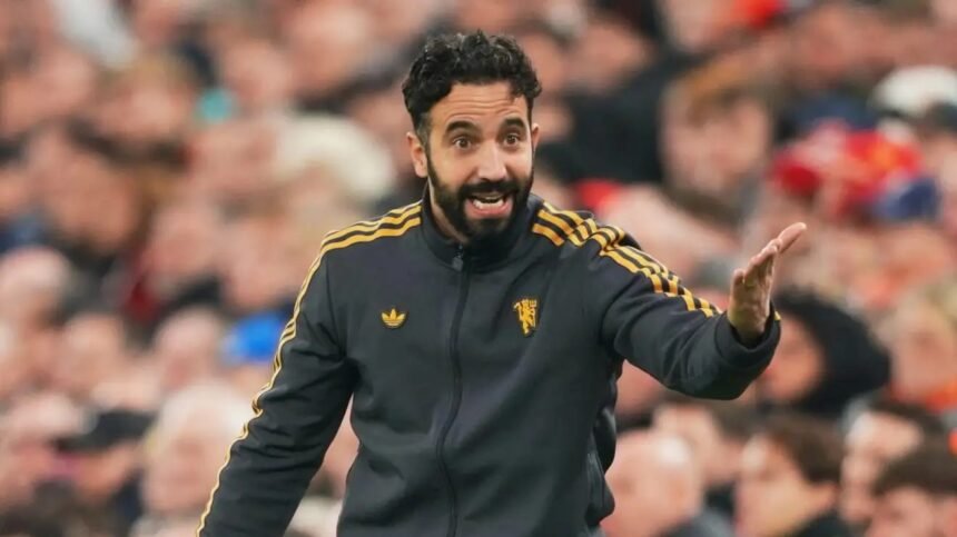 Ruben Amorim speaks to his players during a match.
