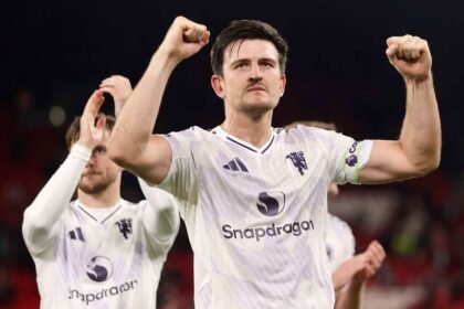 Match-winner Harry Maguire celebrates after Man Utd beat Liverpool at Anfield