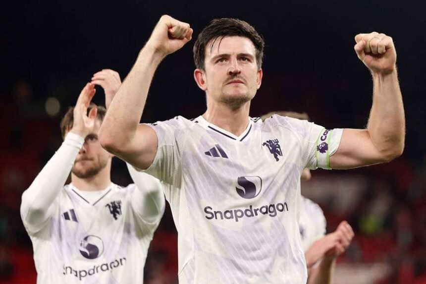 Match-winner Harry Maguire celebrates after Man Utd beat Liverpool at Anfield